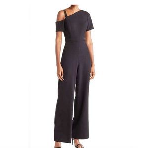 Asymmetrical black jumpsuit Focus by Shani.  Size 12, fits like a 14.